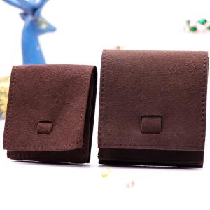 China Flap Fabric Drawstring Gift Bags Embossed Logo With Microfiber Material factory