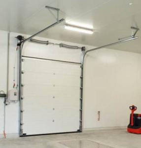 China Commercial Sectional Overhead Door 50mm-80mm Thickness Insulated Garage Door With Brown Locks Hardware factory