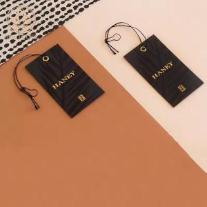 China Black Embossed Clothing Labels Eco Friendly Luxury Printed Custom Label Tags For Clothing factory