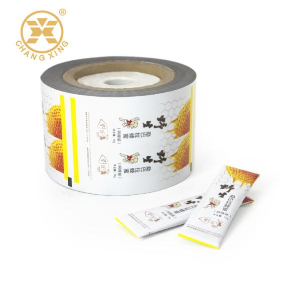 China Aluminum Foil VMPET Honey Sachet Packaging Self Adhesive Laminate Roll factory