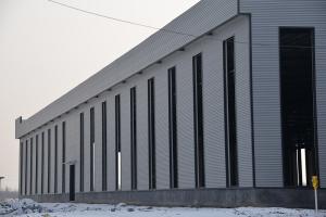China Logistics Park Customized Steel Structure Q235B Prefabricated Metal Warehouse factory