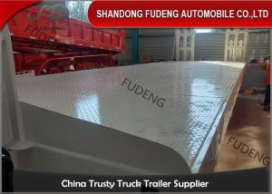 China Fudeng 4mm pattern floor 3 Axles 60T Low Bed Semi Trailer factory