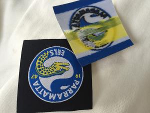 China Heat Cut Woven Iron On Garment Labels With Glue Back , Custom Name Labels For Clothing factory