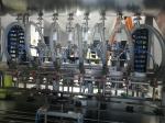 Stainless Steel Bottle Packing Machine 4 Nozzle 30BPM Automatic Filling And