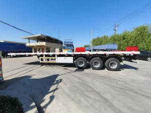 China 3 Axles 20FT 40FT Semi Truck Flatbed Trailer Container Transportation 60-100 Tons factory