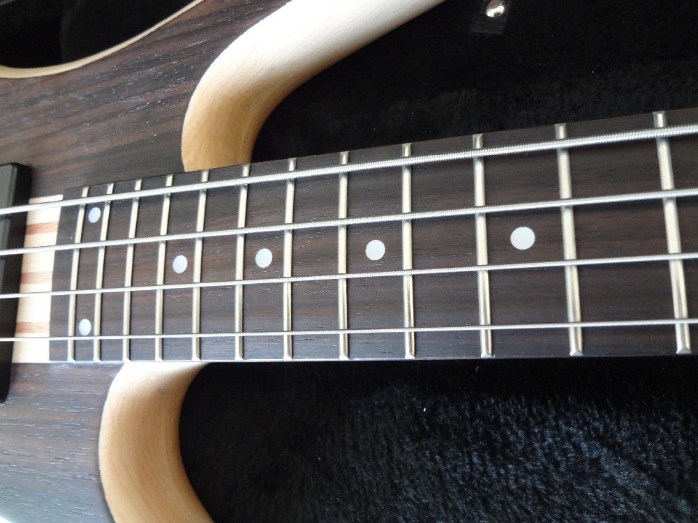 4 string bass guitar walnut wood top with Ash body Original bridges Neck through body MOP dot inlay on rosewood fretboar