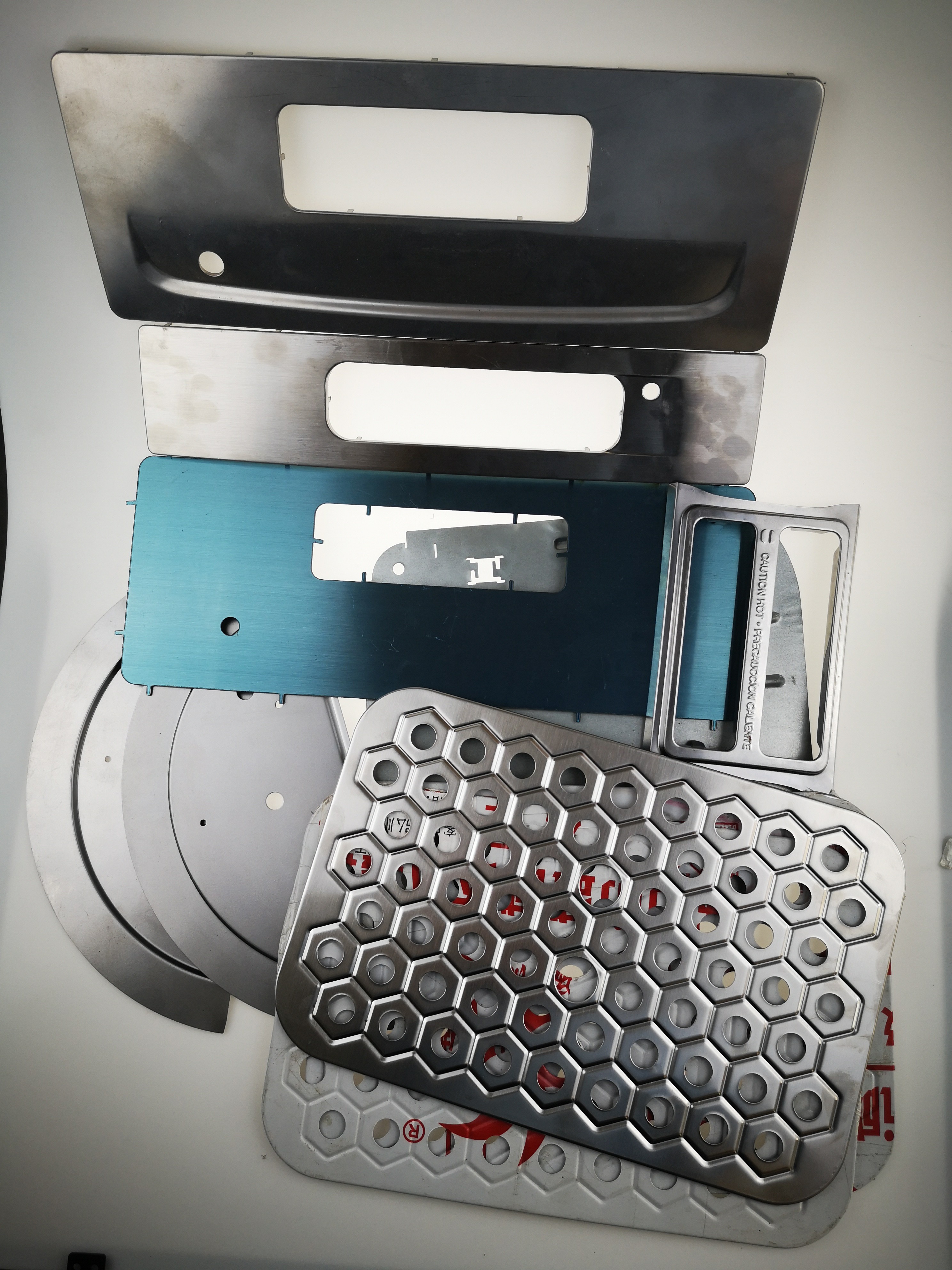 Custom Precision Stamped Metal Panels – Decorative Covers, Vent Grilles & Enclosure Plates with Punching, Embossing, and CNC Finishing