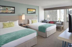 China Pattaya resort hotel fixed hotel furniture used melamine board bedroom furniture set with cabinets and fabric hotel sofa factory
