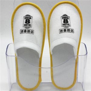 China Unisex Disposable Spa Slippers Bulk Hotel Guest Slippers With Embroidered Design factory