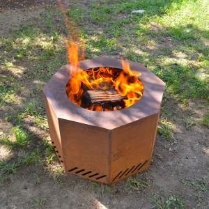 China Camping Heater Wood Burning Corten Steel Round Fire Pit In Outdoor Living Space factory
