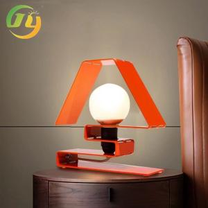 China Acrylic Nordic creative minimalist designer bedside bedroom high-end iron table lamp factory