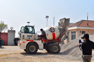 China 2 Cubic Meter Automatic Rotating Drum Cement Sand Mixer Concrete Carrier Truck on sale