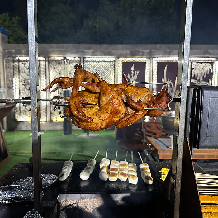 corten steel bbq grill with rotating chicken rack