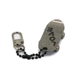 China Alloy Doll Key Chain Boy Skateboard Shape For Clothes 5cm×2cm Size factory