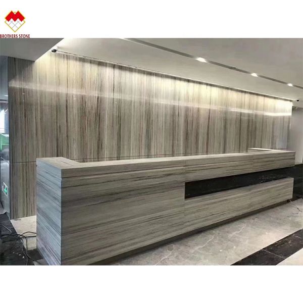 White Wood Look Marble Tiles Stair Follow Veins for a Versatile and Timeless Design