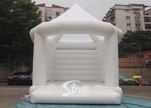 China 5x4m commercial grade adults white wedding bouncy castle with steeple shape top factory