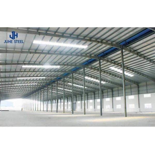 Prefabricated Light Weight Workshop with Rolling Door and Solid H-shape Steel