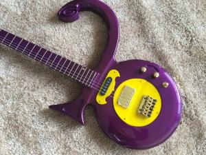 China Custom guitar shop prince guitar Purple color boat anchor electric guitar with golden hardwares plastic pickguard factory