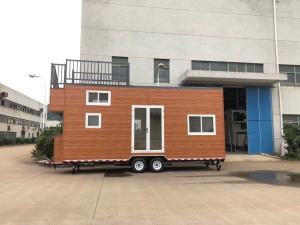 China Light Steel Frame Prefab Tiny House On Wheels With Small Terrace For Sale And For Rent factory