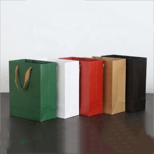 China Simple Style Gift Bags With Ribbon Handles CMYK 4 Color Offset Printing factory