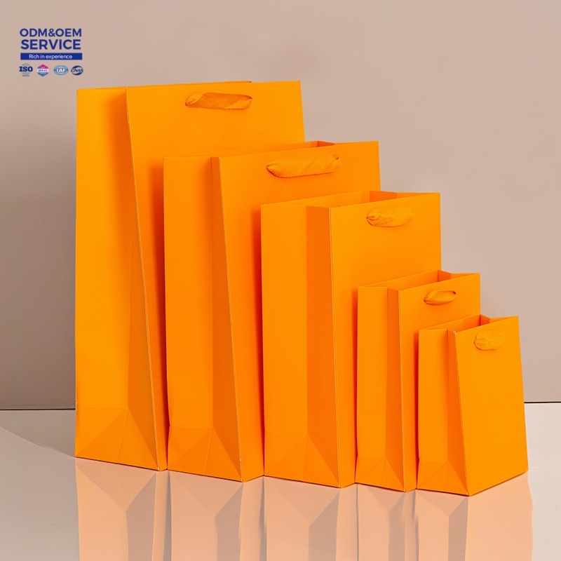 China Hot Sale Manufacturers Recyclable Kraft Paper Handle Bag square Bottom Shopping Gift Bag Packaging Paper Bags with Handles factory