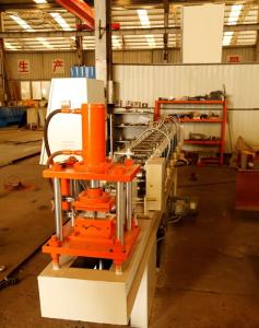 China 75mm Roller Shutter Door Roll Forming Machine With Punched Hole Or Punched Slot factory