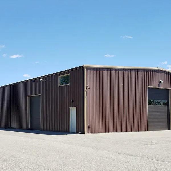 Low cost China Factory Customized Prefabricated Metal Building Kits Workshop