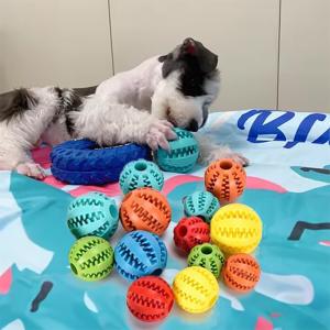 China Pet Dog Rubber Treat Dispensing Ball Hiding Food Puzzle Bite Interactive Pet Ball Chew factory