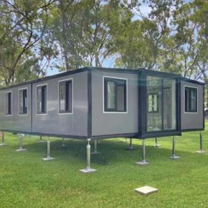 China Roomy Double Wings Foldable Expanding Container Homes Luxury Family Residences factory