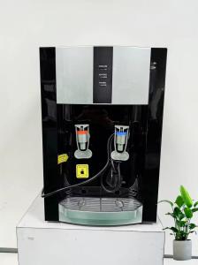 China 220V/50Hz Desktop Hot And Cold Water Dispenser With CE Certification factory