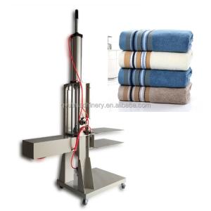 China Towel Packing Press Machine with 300mm Stroke Height and Automatic Pillow Compression factory