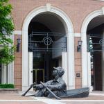 People Rowing Boats Bronze Statues Sculpture On Streets Of Park Square