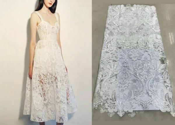 China Shiny Sequin Embroidered Floral Beaded Bridal Lace Fabric Light And Transparent Texture factory