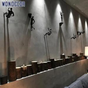 China WONDERS Home decor Brass Wall Sculpture climb shape Dark Yellow factory