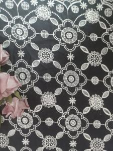 China Tribal Embroidered Eyelet Fabric Contrast Color Lace For Lady Garment factory
