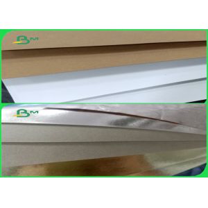 China 0.55mm Brown White Gold Color Wrinkle Free Washable Kraft Paper Roll For Bags on sale