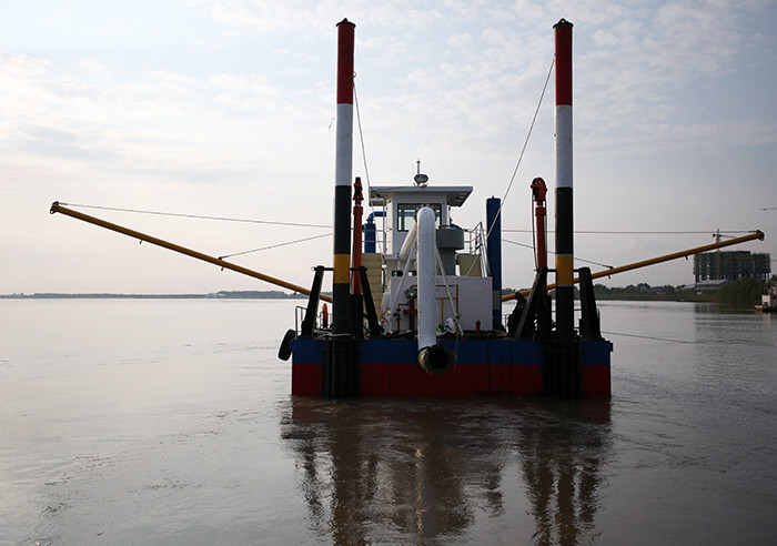Dredging Vessel Red Color Designed To Dig To A Depth Of Twelve Meters