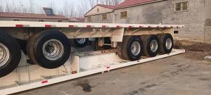 China Semitrailer Second Hand Semi Trailers 13-15Tons Low-Flat Semi-Trailer 3/4/5/6 Axle factory