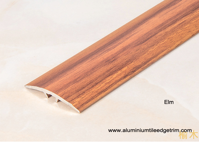 Elm effect carpet to wooden floor trim