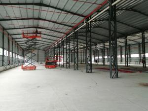 China Hot Dip Galvanized / Painted Steel Structure Warehouse Buildings Pre Engineered factory