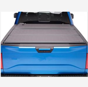 China 4X4 Car Accessories Hard Tri Fold Tonneau Bed Cover For Nissan Navara NP300 factory