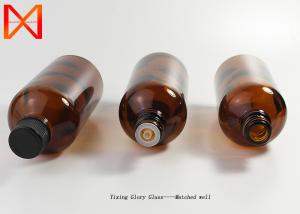 China Round Brown Essential Oil Bottles Modern Stylish Precious For Beauty Cosmetics factory