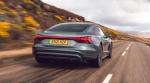 a low, long, wide and lean looking four-door car at 2023Audi e-Tron GT pure