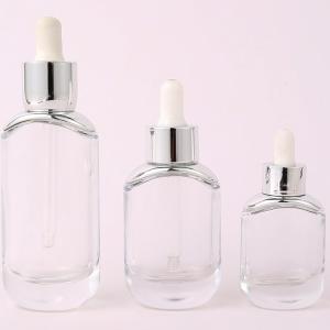 China Oval Glass Empty Dropper Bottles Clear Skin Care Essential Oil Customized Logo factory