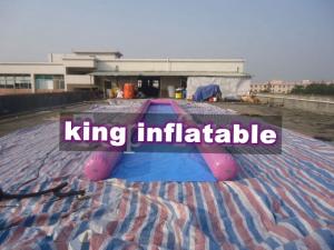 China Purple / Blue 0.9mm PVC Inflatable Big Air Slide / Circle / Blob For Water fun factory