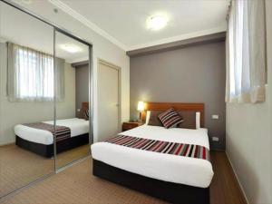 China Hotel Standard Studio room furniture of Laminate wood made panel bedroom sets with Leisure sofa and TV tables factory