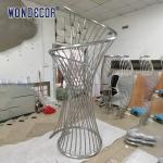 Large abstract outdoor square geometric metal art cross spiral circular tube