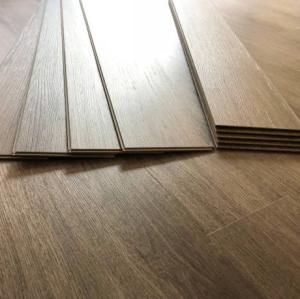 China 8mm-12mm Piano Glossy High Gloss Wood Laminate Flooring T G Installation Waterproof factory