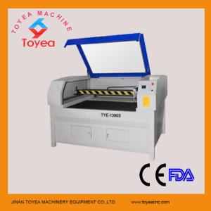 China Auto feeding leather laser engraver machine with 1300 x 900mm TYE-1390S factory