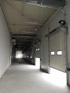 China Large Auto Lift 40mm Panel Steel Sectional Door Motorized factory